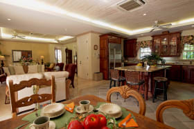 Open plan kitchen indoor dining and Tv room