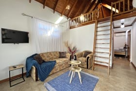 Living area with loft upstairs