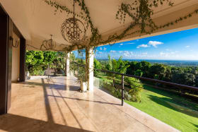 Verandah overlooks the Mango farm and sea view beyond