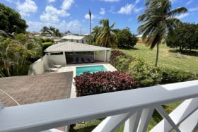 View from main bedroom balcony of pool