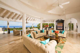 Main living area with opening to the outdoor pool terrace