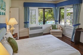 Ground floor guest bedroom with pool views