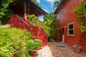 A separate gazebo adjoins the pool area
