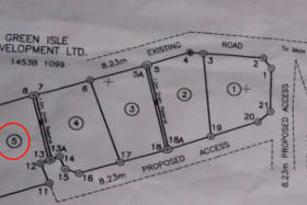 Survey plan of the lot, identified by Lot 5 and with the red circle around it.