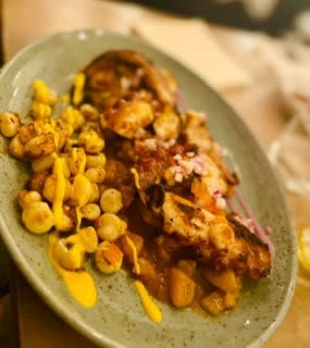 Grilled Pulpo ​Octopus Tentacles, sliced, on the grill and marinated in a distinct Peruvian Panka chilli sauce, with a base of Andean & mandel potato puree - Checa, Stockholm