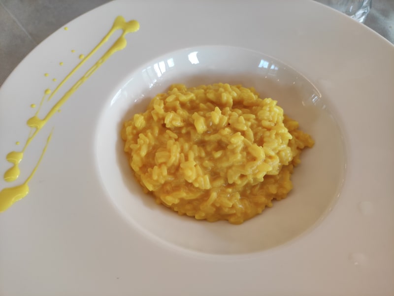 Risotto alla crema di parmigiano e curcumama - Trattoria Ricomilla