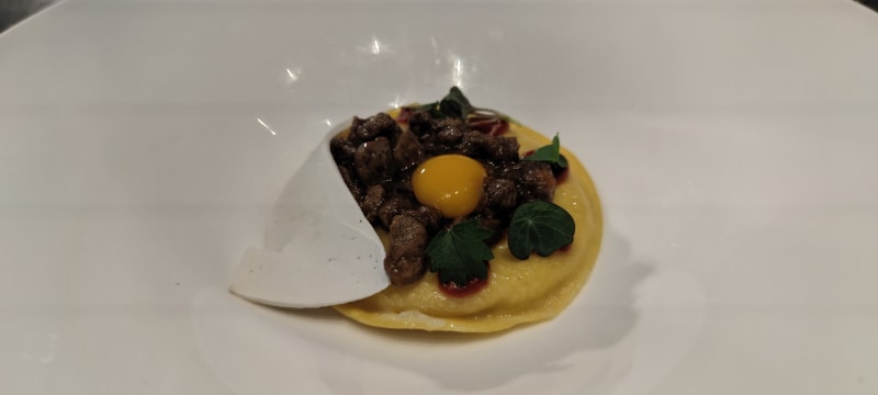 Raviolone con ragù di agnello e uovo di quaglia - La Musa Restaurant & Rooftop Terrace