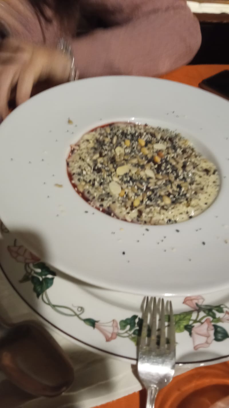 Risotto al parmigiano con semi e tostati e lampone - 1396 Osteria Ponteveccio