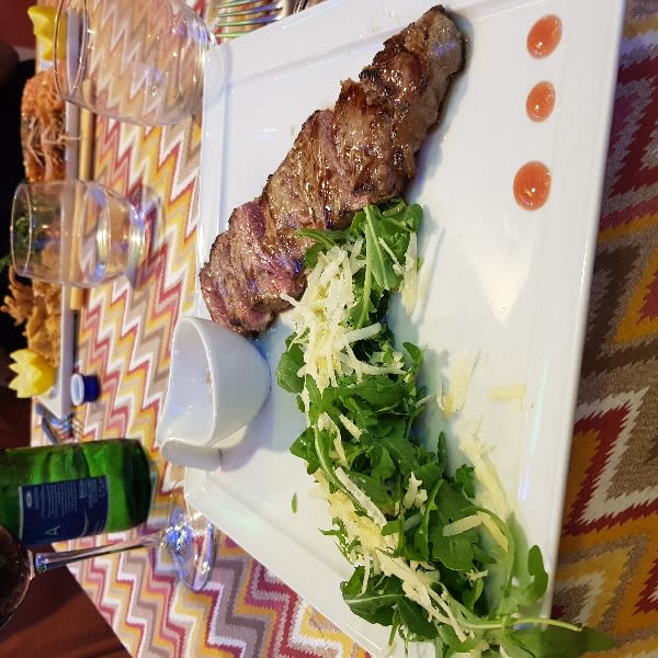 Tagliata con grana e rucola. - Guernica by Luciano