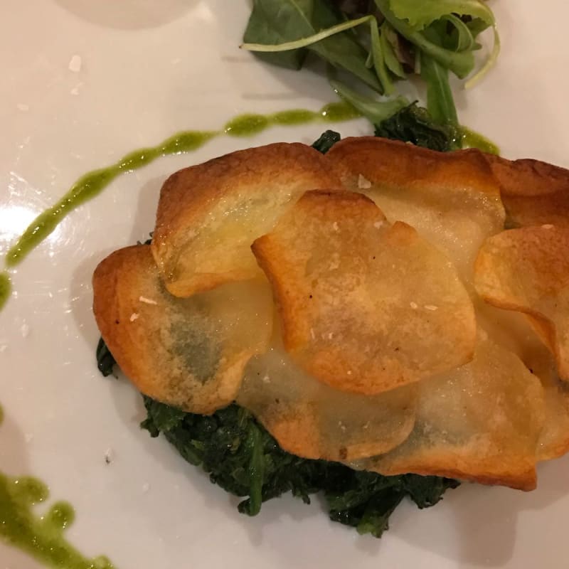 Very delicate, served on top of seared spinach, covered by very thin sliced potatoes... keeping all its flavor and juice. - La Taverna dei Golosi, Milan