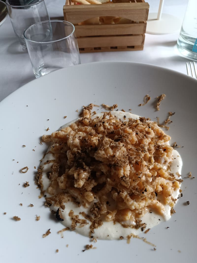 Passatelli asciutti con fonduta di parmigiano e tartufo nero - Ristorante L'infinito