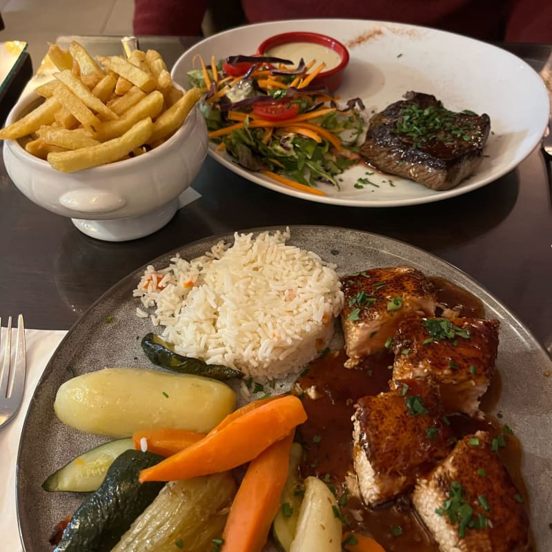 Salmon( on special board ) and steak with Roquefort sauce - Café Blanche, Paris