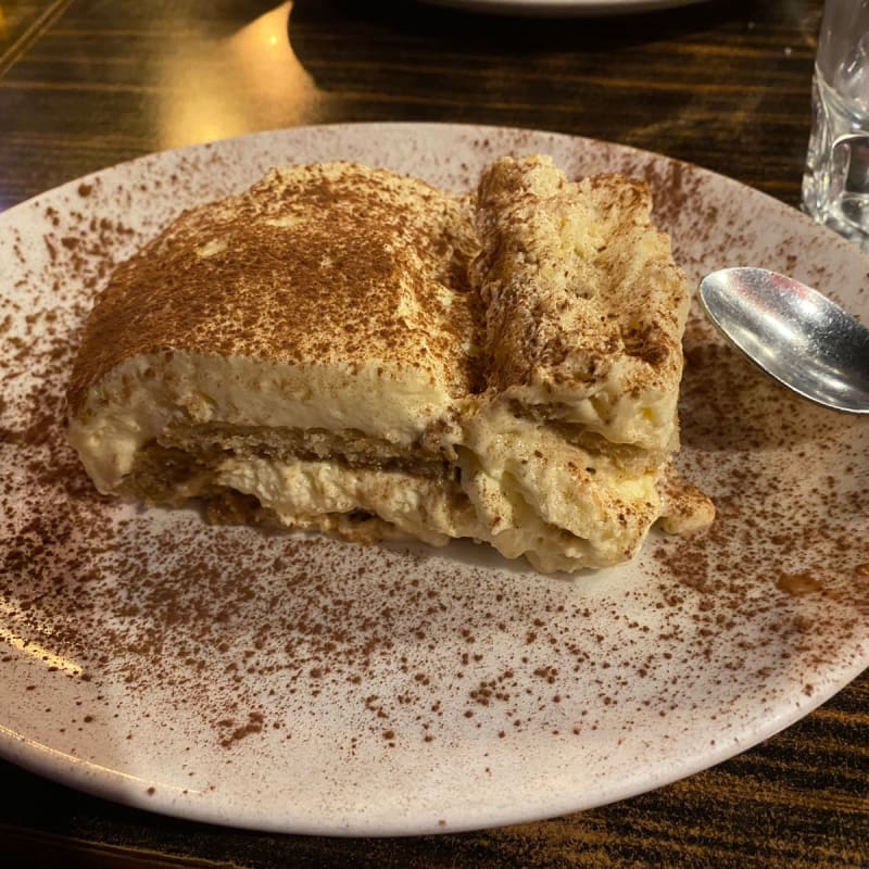 The Tiramisu dessert was amazing. Shocked when it came as it was a very generous portion, one was more than enough to share. We ate both anyway!!  - La Rughetta, Paris