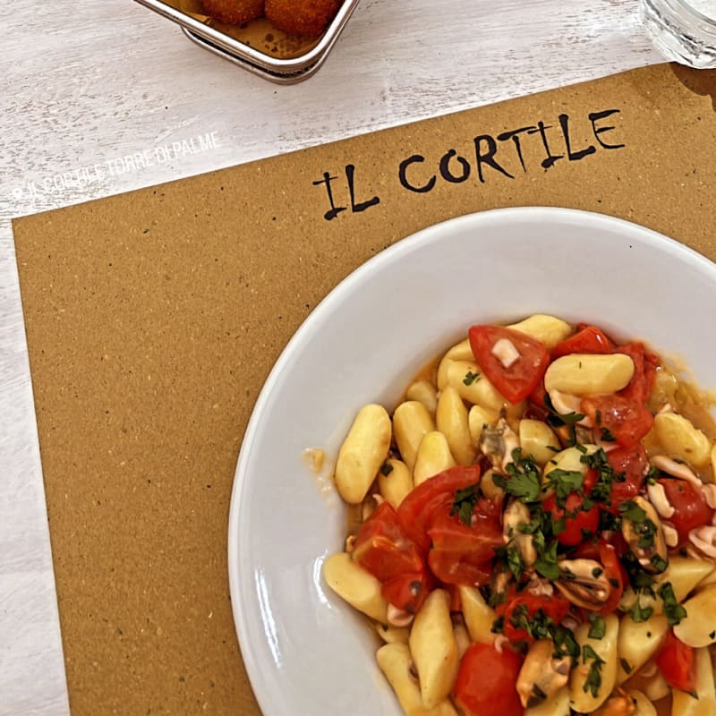 Gnocchi cozze calamari e pomodoro pachino  - Il Cortile - Primeria Friggitoria