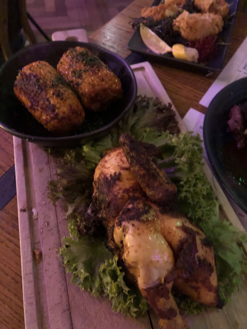 ½ chicken prepared on charcoal - Oslo Beers, Amsterdam