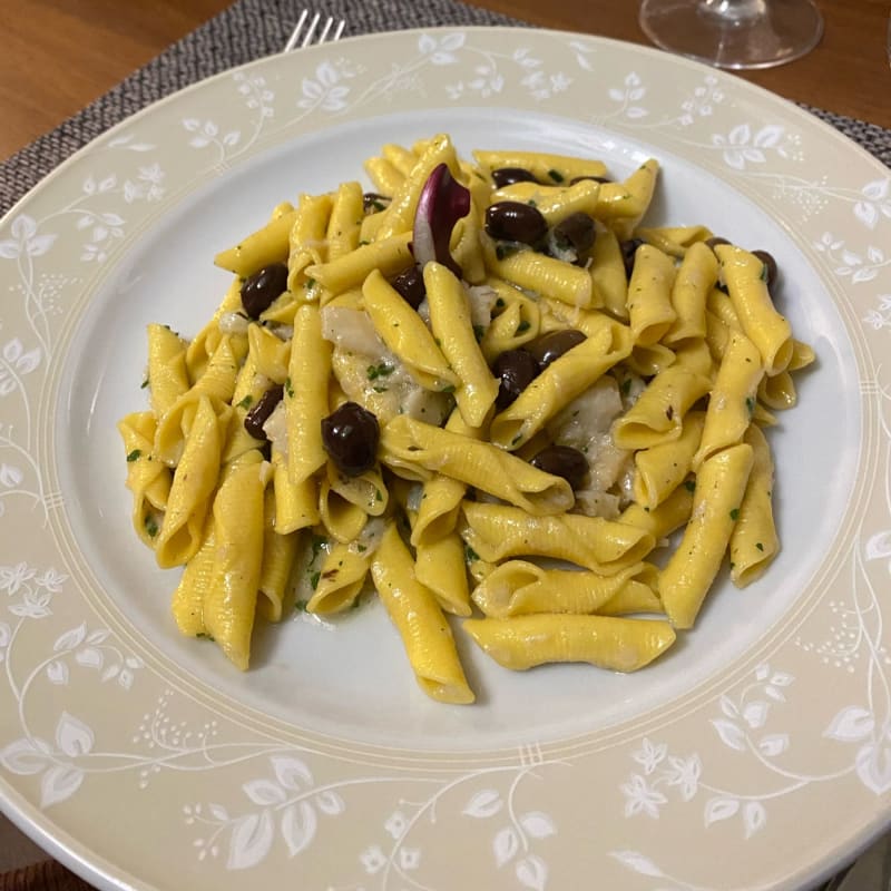 Garganelli con baccalà e olive taggiasche - Osteria Perbacco, Treviso