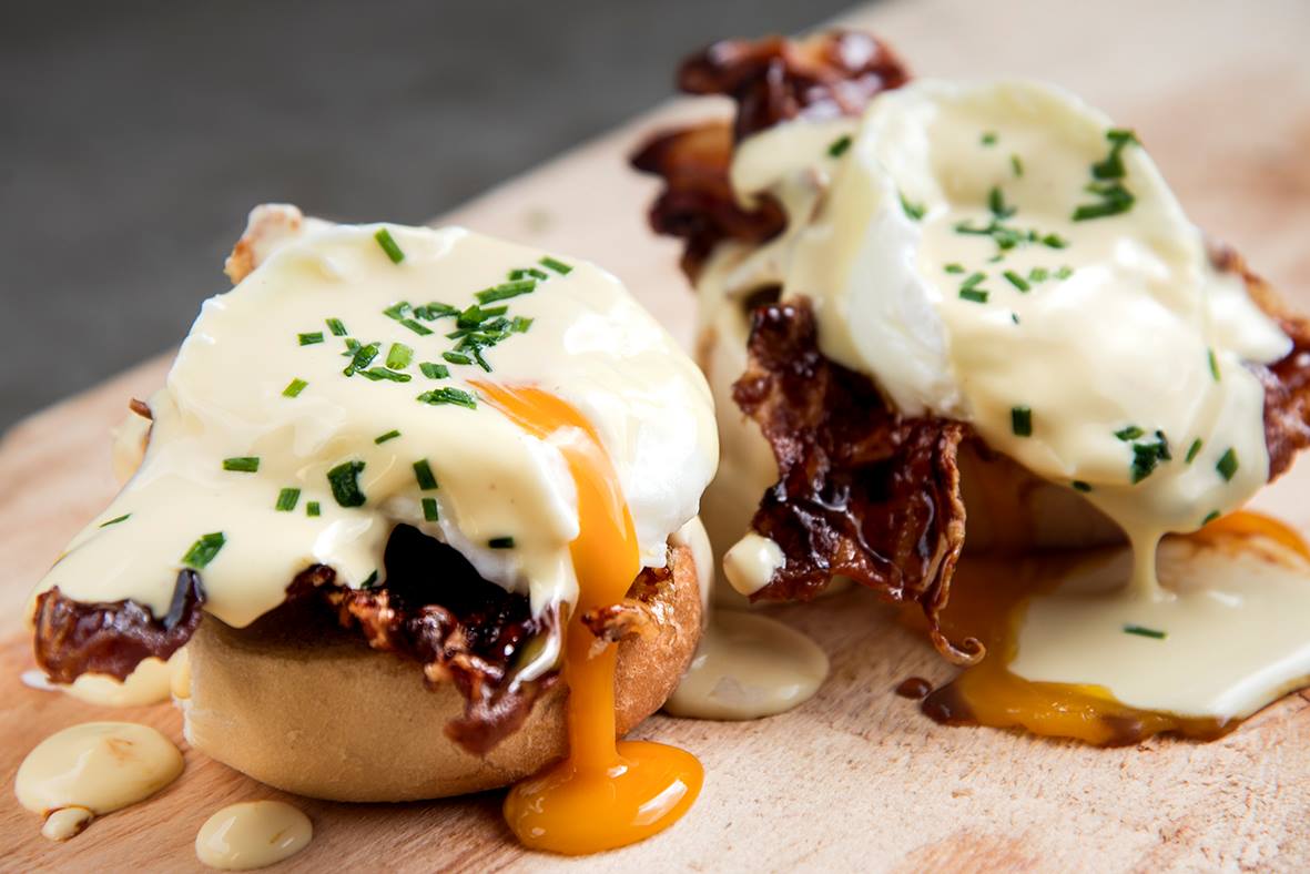 Eggs Benedict - two home-made English muffins topped with crispy bacon, creamy avocado or smoked salmon along with poached eggs and Hollandaise sauce - FAB, Maastricht