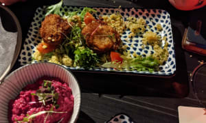 Breaded stuffed mushrooms served on a bed of cous cous and tomato tabouleh  - Rocco, Cairns City (QLD)