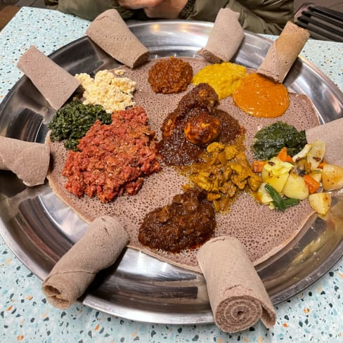 Mix of the meat and vegetable dishes, plus a raw beef dish I forget the name of - Gursha Ethiopian Restaurant, Blacktown (NSW)