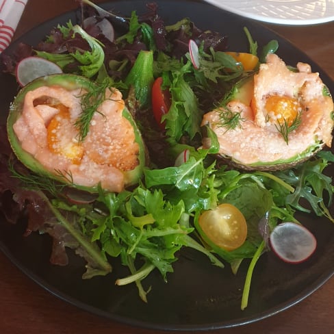 Avocado with salmon and egg yolk