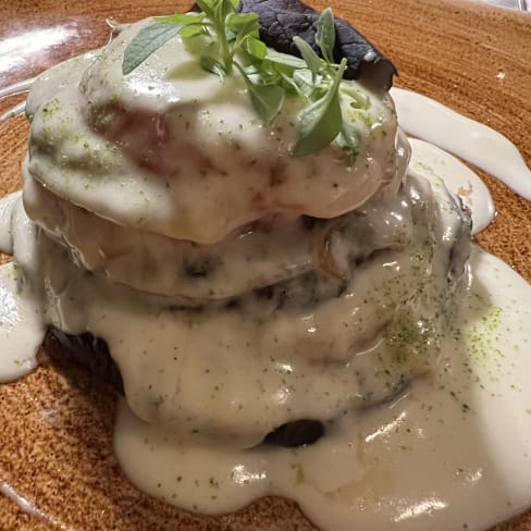 Millefoglie di melanzane con bufala DOP e pomodoro, fonduta di parmigiano e basilico cristallizzato - Le Terrazze al Colosseo, Rome