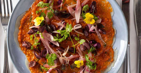 Carpaccio de lieu noir, tomates confites et olives de Kalamata. - Bel Canto Paris - Hotel de ville , Paris