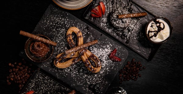 Some treats, churros con nutella and chocolate lava cake - Caliente Tapasbar City, Stockholm