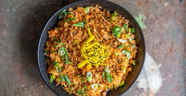 Kimchi Fried Rice edamame, black fungi, mungo sprouts, season’s vegs, crispy onions, daikon, scallions  - SOIL Vegan Café - WEST, Amsterdam