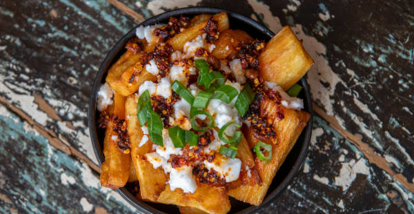 Yukas Bravas: cassava, feta, chili crisp, chives  - SOIL Vegan Café - WEST, Amsterdam