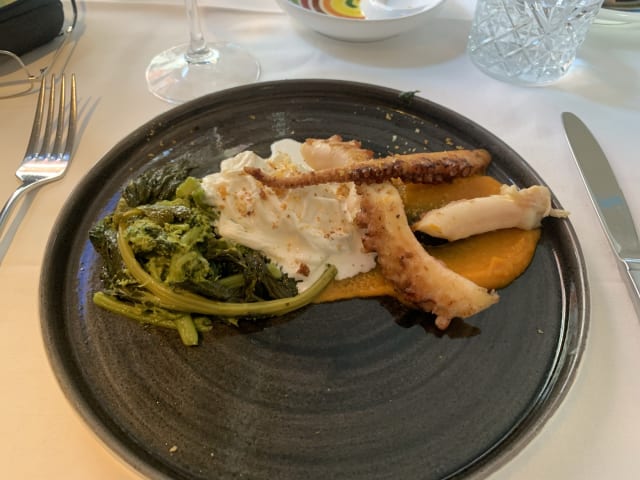Grilled octopus on sweet potato cream with turnip greens sauteed in the pan and stracciatella cheese - Il Mosto Selvatico