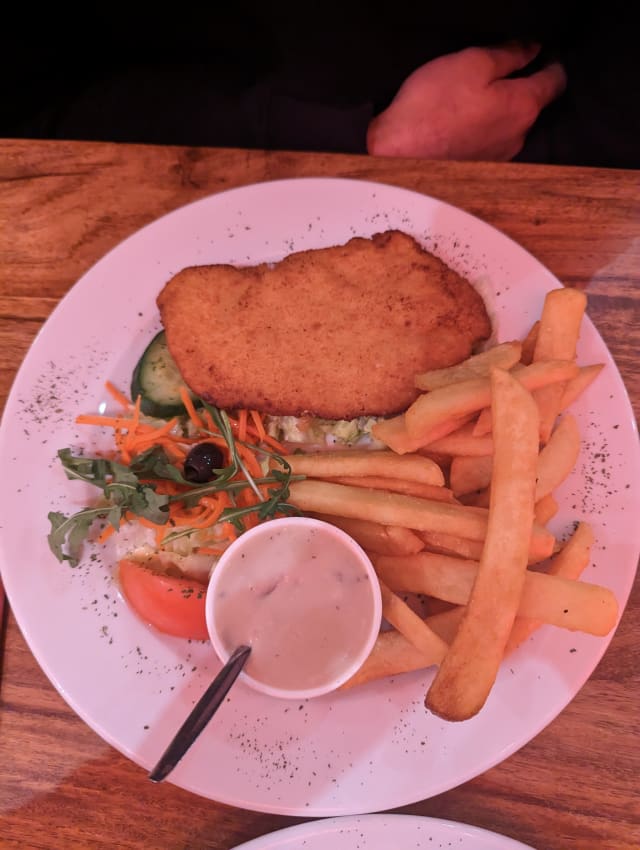 Schnitzel ( Fried Breaded Schnitzel )  - La Santa Maria International Dinner