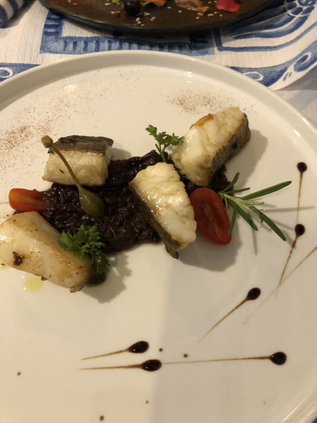 Baccalà su cipolla caramellata - Officina zio Pesce