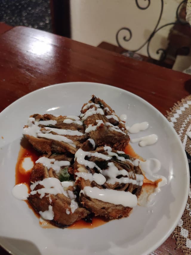 Parmigiana arrotolata in crosta di pane panco. - Da Leopoldo