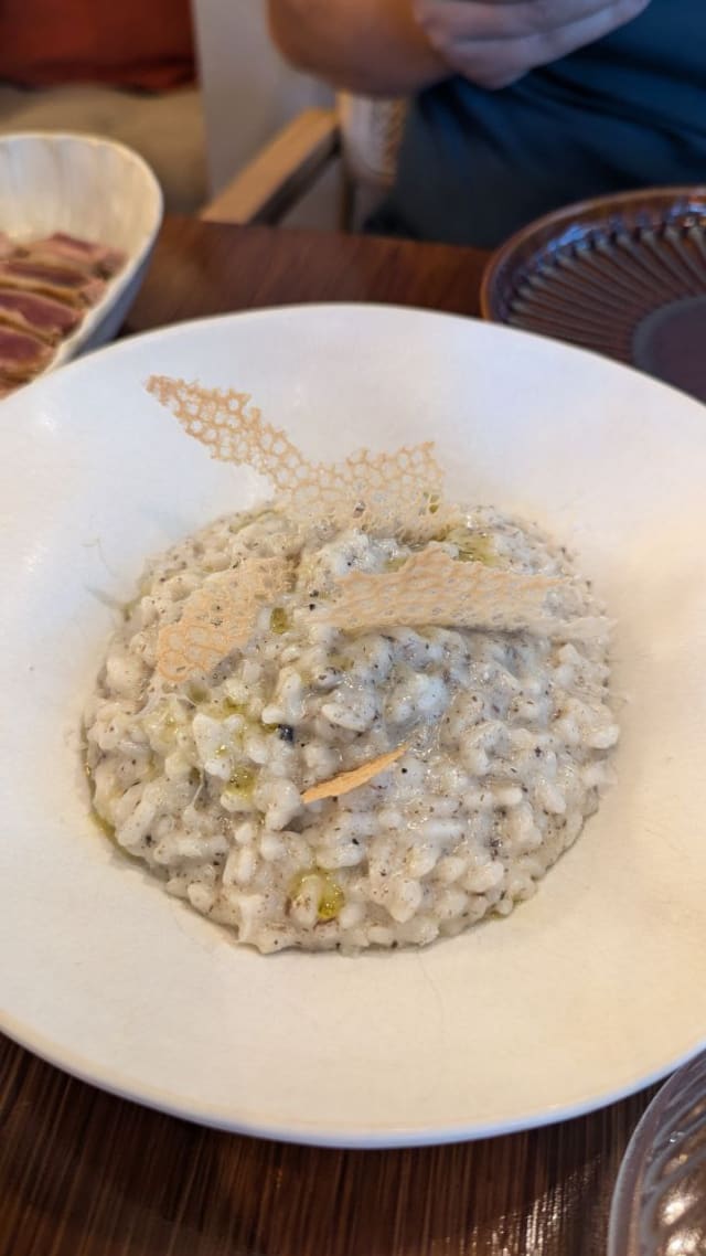 Risotto com manteiga trufada e parmesão - André 