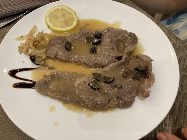 Scaloppina al Tartufo Nero - Ristorante Hotel Fini