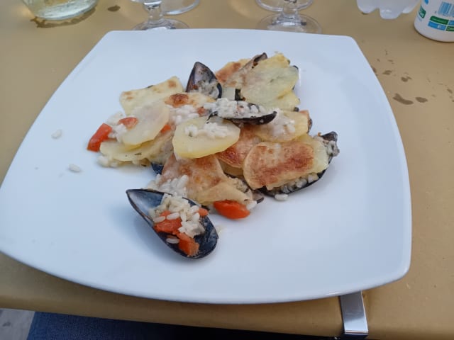 Riso cozze e patate. - La Piazzetta