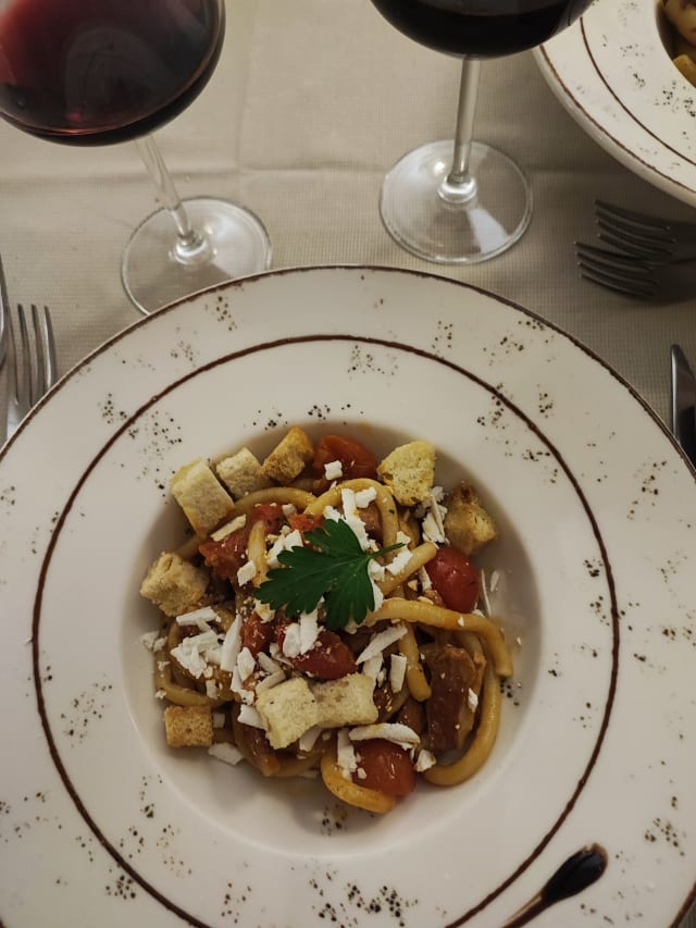 Pici freschi al pomodorino e rigatino di maiale - Oliviero Ristorante dal 1962, Florence