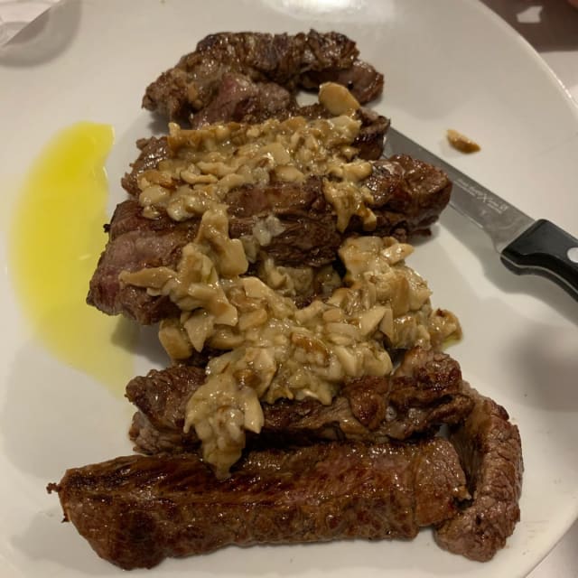 Tagliata di Angus Argentino (scaglie di grana e rucola/ funghi porcini) - La Tavernetta, Imola