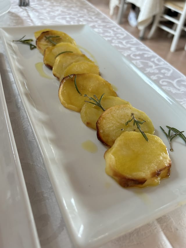 Patate al forno - Ristorante Enoteca “Osteria del Lago”