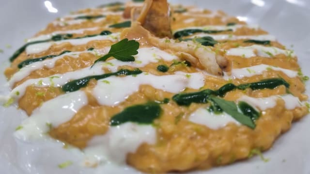 RISOTTO CARNAROLI ALLA CREMA DI SCAMPI CON DRESSING AL LIME E Mascarpone e nudo di scampo - Elios Café, Rome