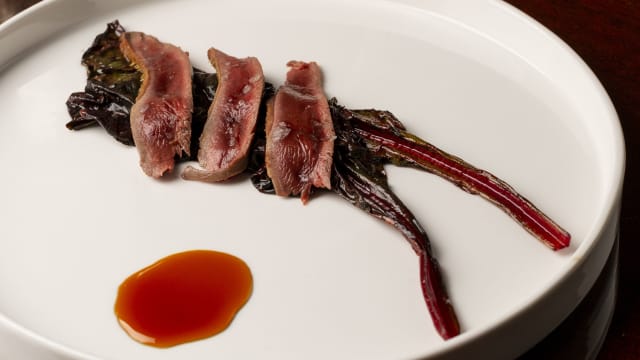 petto e coscia di piccione | bietole | riduzione di Americano | salsa di cioccolato al balsamico - Relais le Jardin Fine Dining Restaurant, Rome