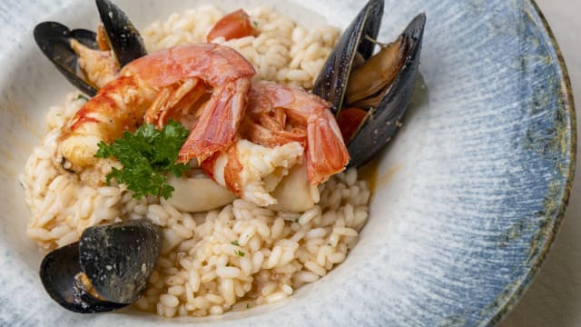 Risotto ai frutti di mare mantecato all’olio E.V.O. - Del Ponte