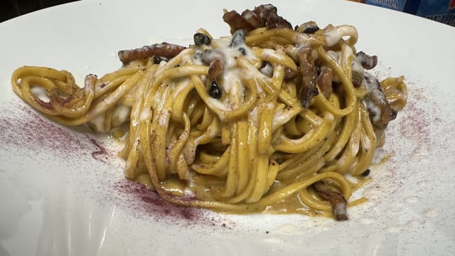 Tagliolini alla carbonara conguanciale ai mirtilli epecorino liquido - Origini Osteria Controcorrente