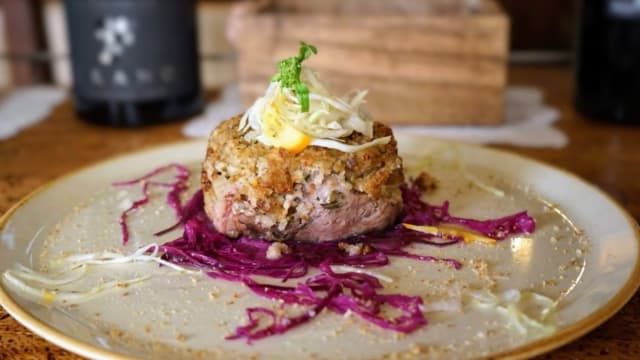 Medaglioni di Carpa regina al forno - Ristorante L'Acquario, Castiglione Del Lago