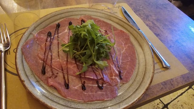 Carpaccio di manzo marinato biologico con crema di aceto balsamico i.g.p. - Ristorante il Cantinone, Peschiera Del Garda