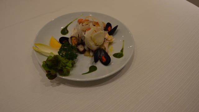 Marinated anchivies served with typical crunchy bread tomato concasee , provolone del monaco and crunchy fennel - Ristorante Garum, Minori