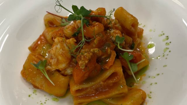 Calamarata pasta, lobster, red prawn, Torre Guaceto tomato and parsley essence  - Ostuni Palace - Il Bistrot, Ostuni