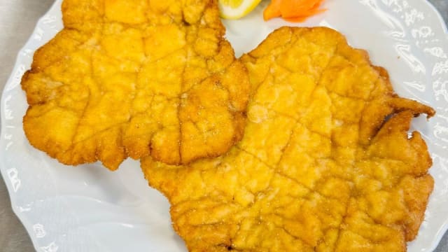 La nostra cotoletta impanata alla milanese - San Colombano