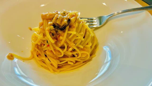 Bavette al ragù di polpo con pomodorini - Osteria del Pesce, Viareggio