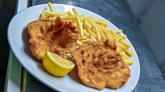 Chicken wienerschnitzel with french fries - Lupo Bianco Canazei